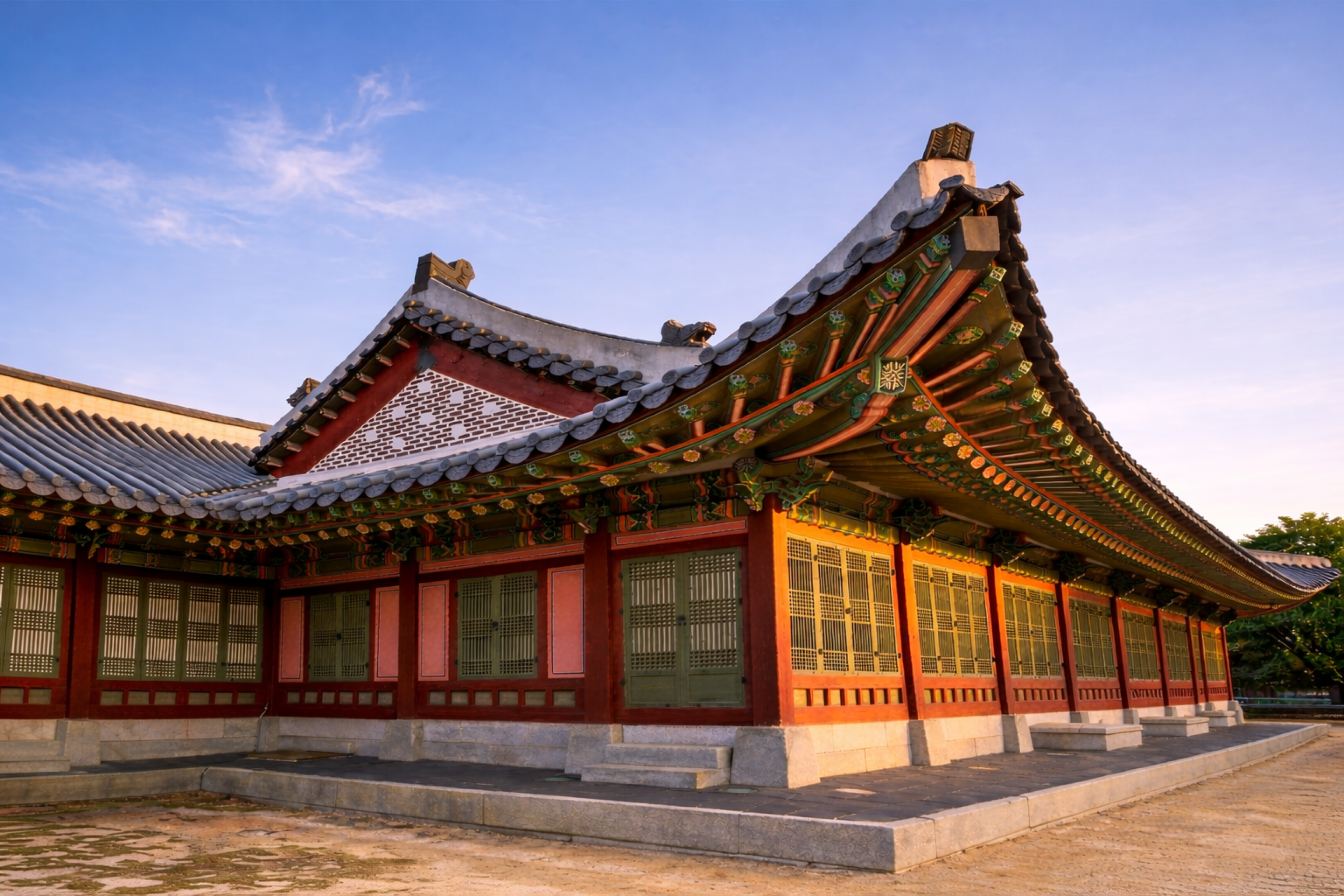 Traditional Korean palace architecture at golden hour